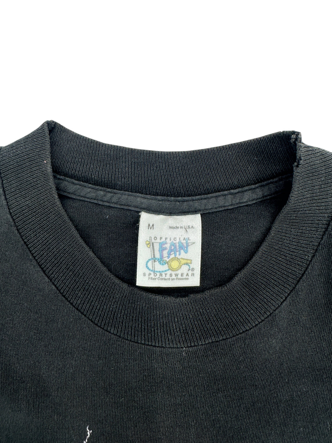 Exile Vintage 1990s Green Bay Packers T-shirt collar tag showing size M and Official Fan Sportswear branding