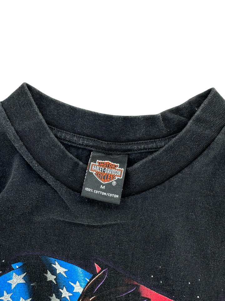 Exile Vintage black 1990s Harley Davidson t-shirt featuring a size M neck label and cotton fabric construction