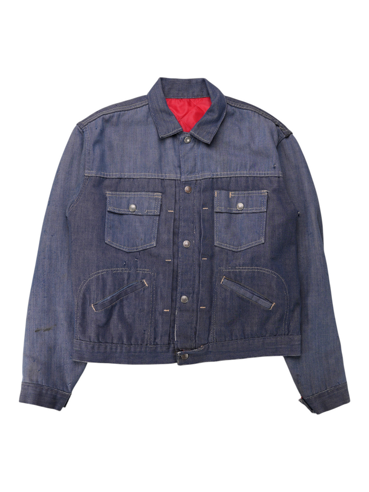 Exile Vintage 1970s J.C. Penny Ranchcraft pleated selvedge denim workwear jacket with a red quilted lining.