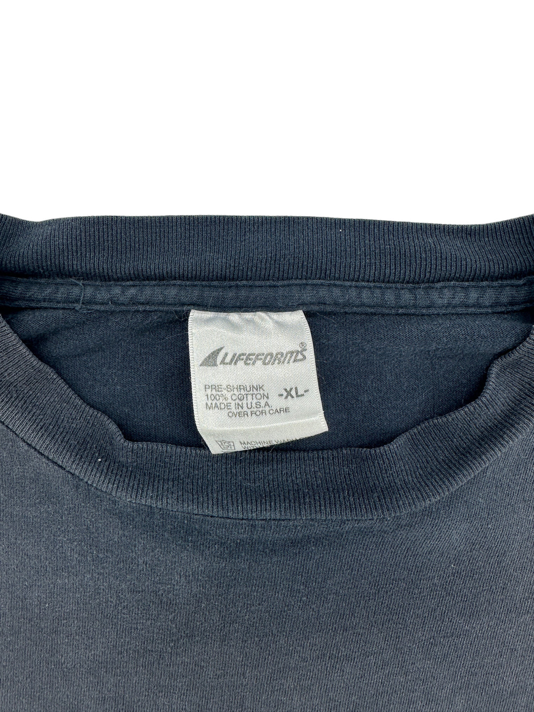Exile Vintage 1990s Lifeforms black cotton t-shirt with XL size tag and Made in USA label