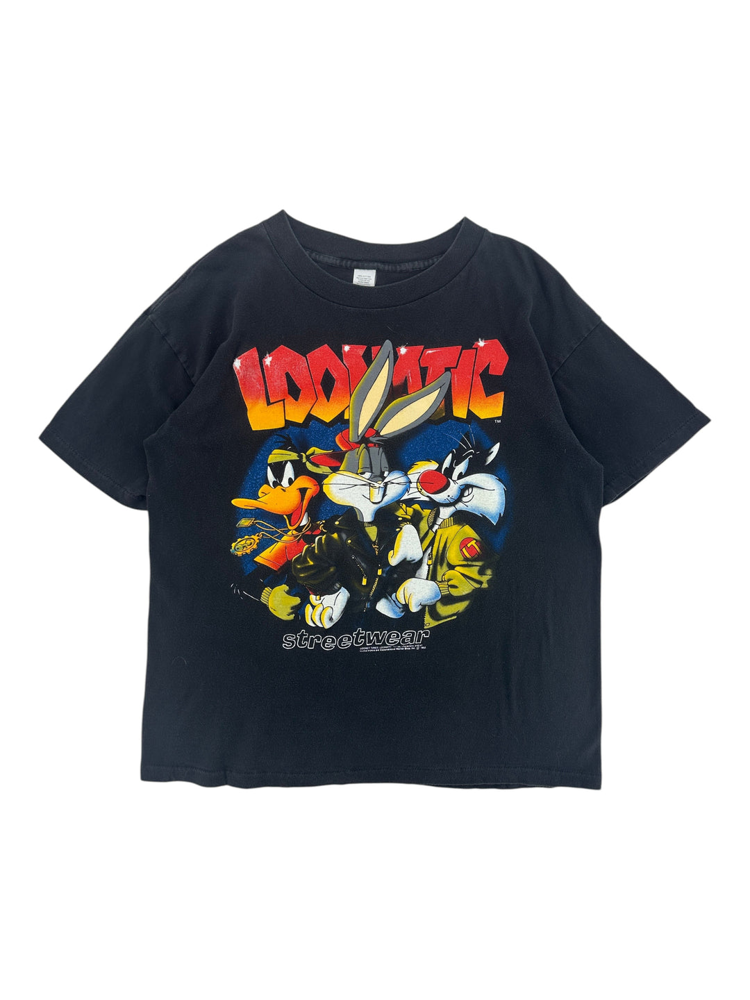 Exile Vintage black 1990s Looney Tunes streetwear t-shirt featuring Bugs Bunny, Daffy Duck, and Sylvester graphic