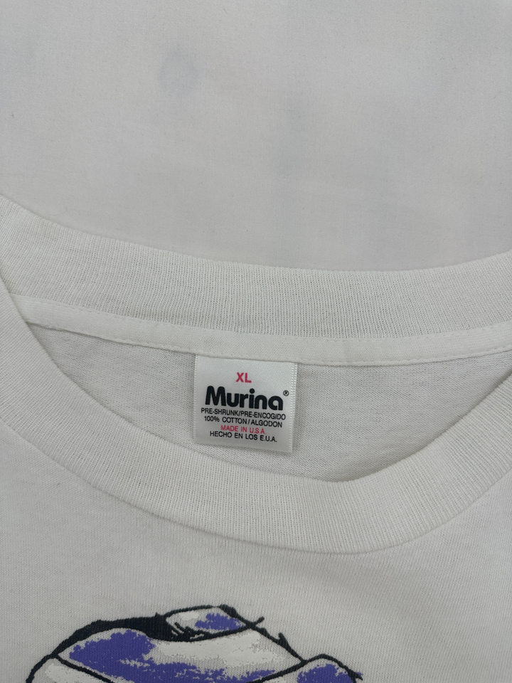 Exile Vintage 1990s Halloween mummy t-shirt featuring a Murina tag on a white cotton crew neck