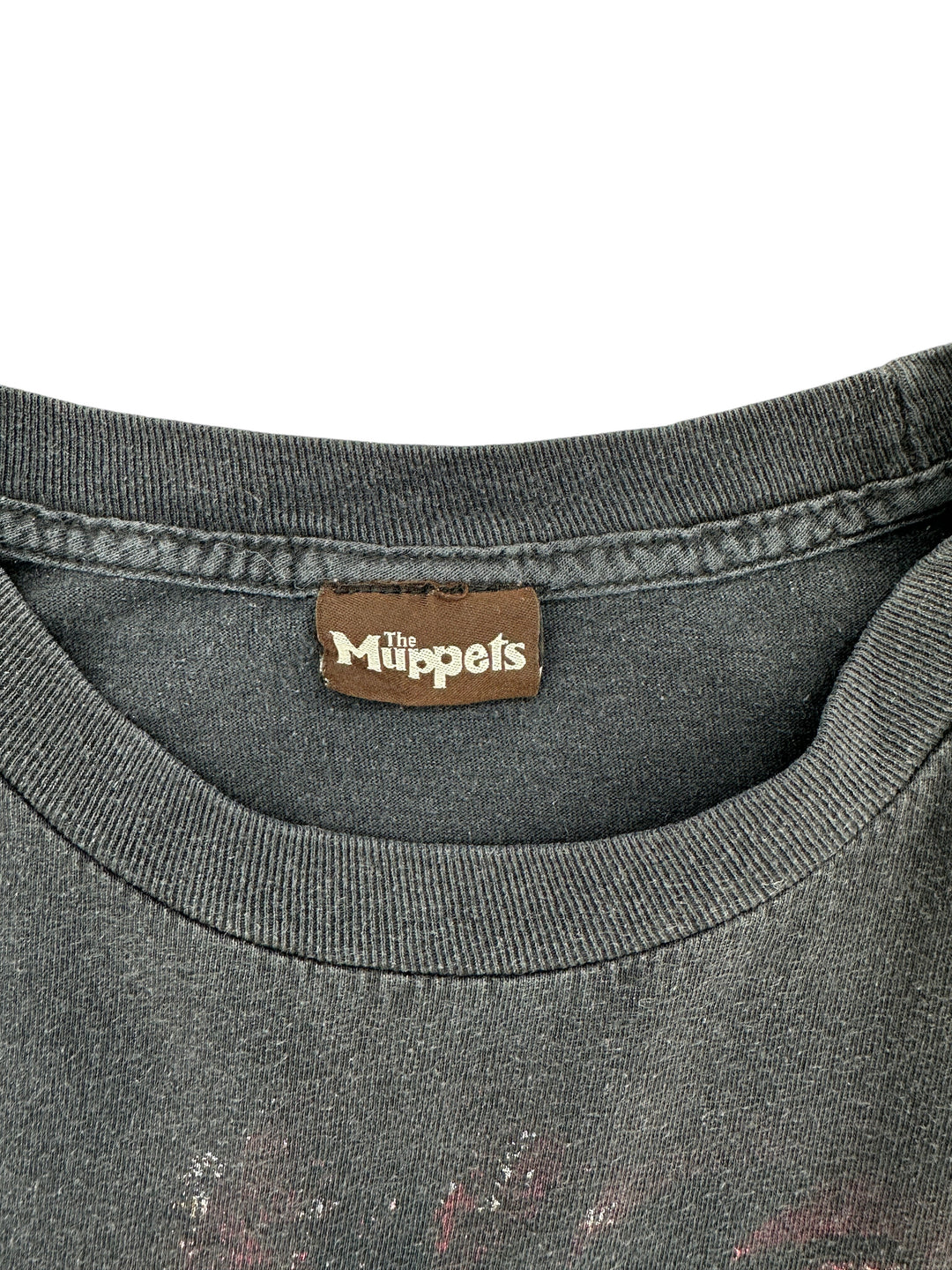 Exile Vintage black Muppets t-shirt with a brown branded neck label, size XL, showing a faded vintage aesthetic.