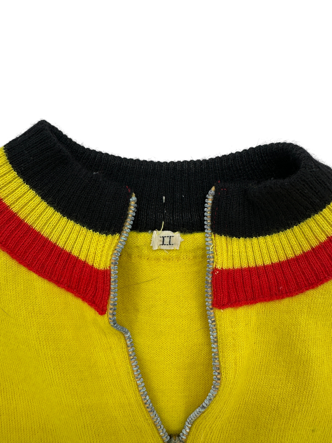 Exile Vintage 1970s Puma Usboerke Gios cycling jersey collar detail with yellow, red, and black ribbed trim