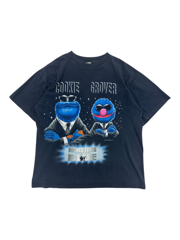 Exile Vintage 1990s Sesame Street Monsters In Blue graphic t-shirt featuring Cookie Monster and Grover in suits.