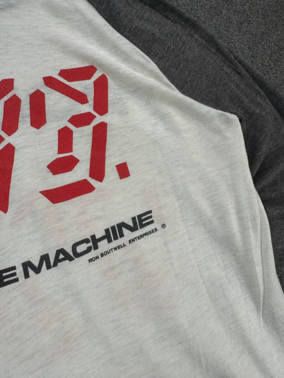 Exile Vintage 1982 The Police Ghost In The Machine raglan t-shirt with red and black graphic print on white fabric