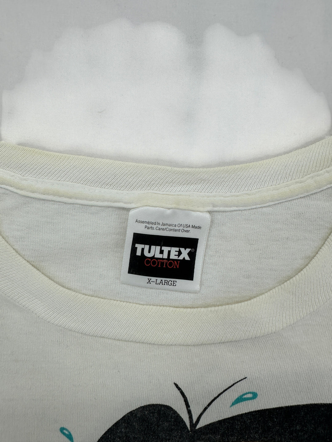 Exile Vintage white cotton T-shirt featuring a Tultex XL neck label with assembly details