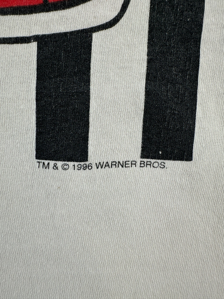 Exile Vintage 1996 Warner Bros Tweety Bird graphic t-shirt detail showing copyright print on white cotton fabric
