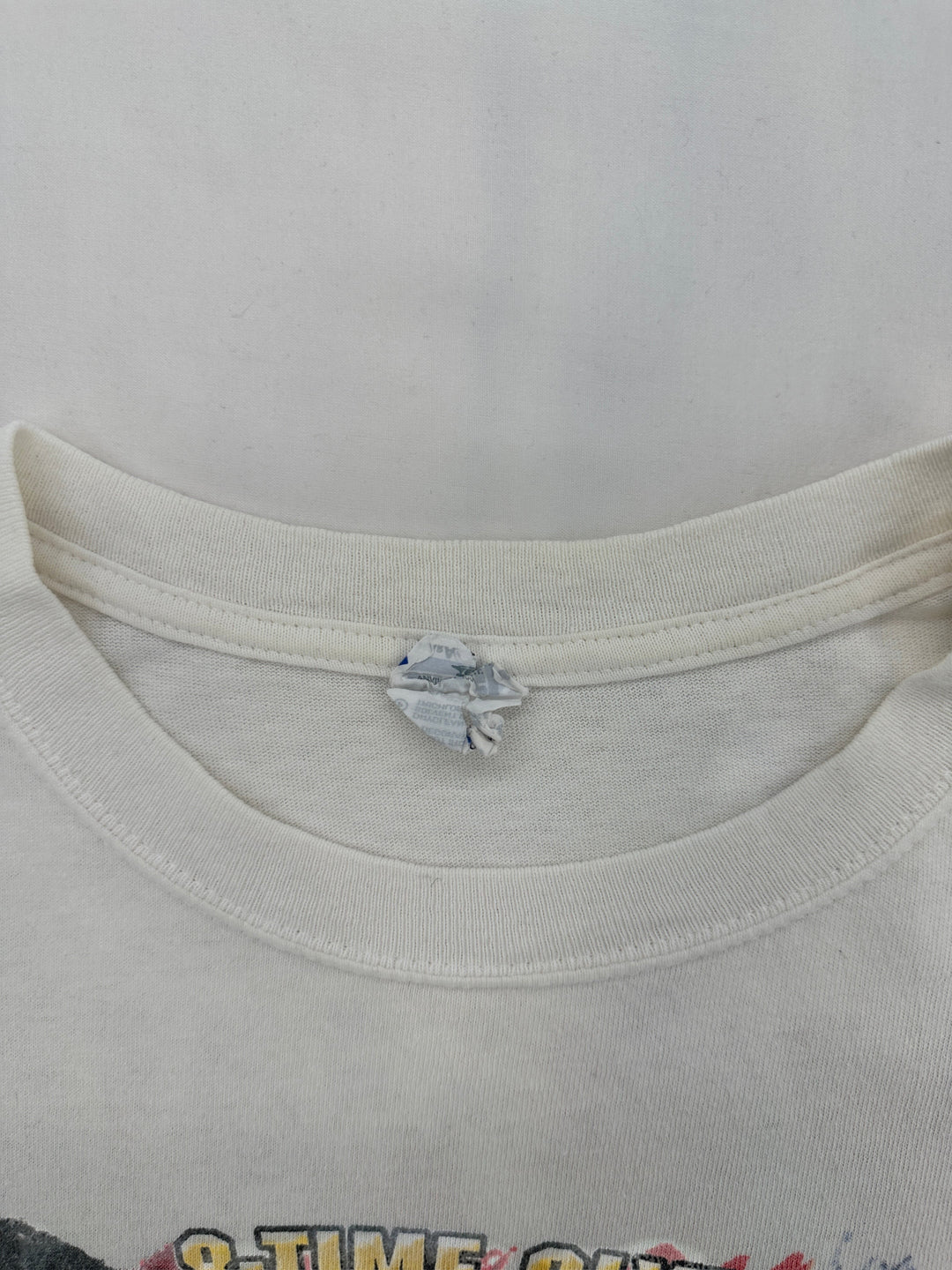Exile Vintage white crew neck t-shirt featuring a worn inner size tag and ribbed collar detail