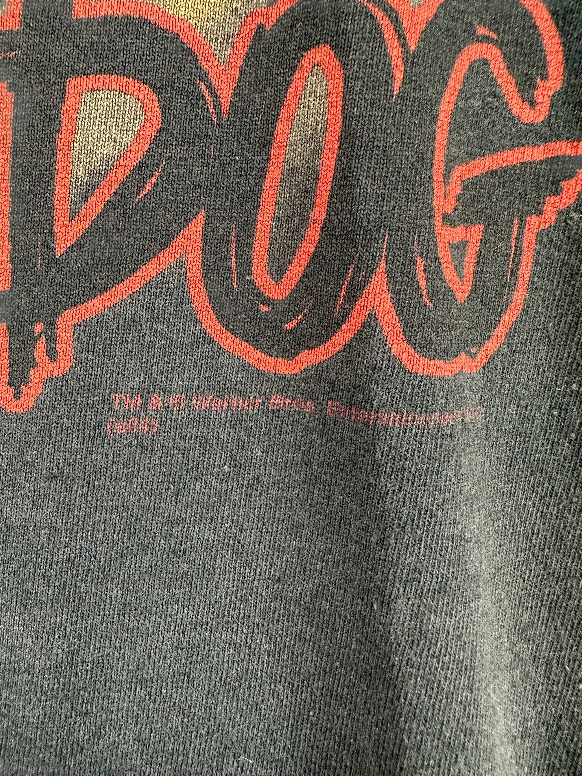 1990s Harley-Davidson x Looney Tunes t-shirt in black cotton with red graphic text and copyright details.