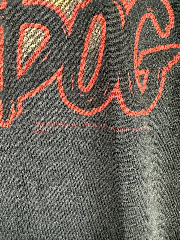 1990s Harley-Davidson x Looney Tunes t-shirt in black cotton with red graphic text and copyright details.